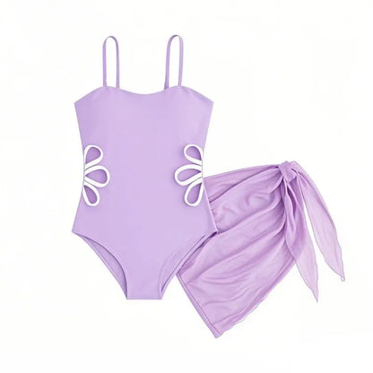 Purple swimsuit with floral designs on a white background