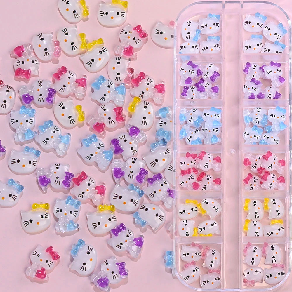 Collection of Hello Kitty-themed decorative items on a pink background