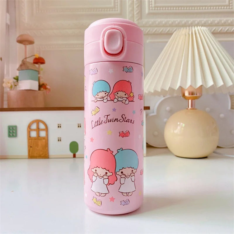 Pink thermos bottle with cartoon characters on a white surface