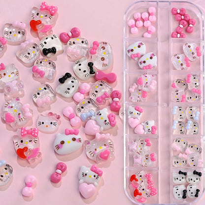 Hello Kitty-themed nail art decorations on a pink background