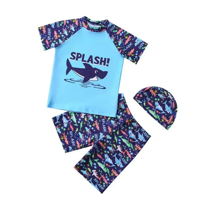 Children's swim set with 'Splash!' text and shark design on a blue shirt, navy shorts, and matching hat.