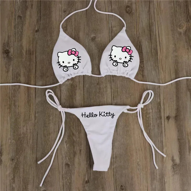 Hello Kitty bikini set on a wooden background