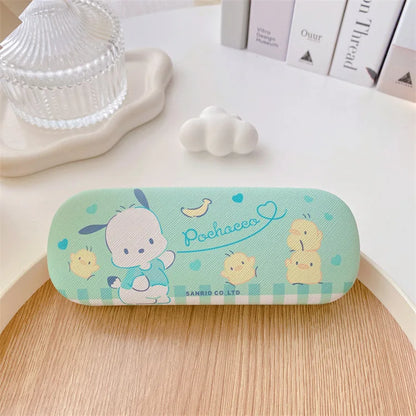 Cartoon-themed glasses case on a wooden surface with a light background