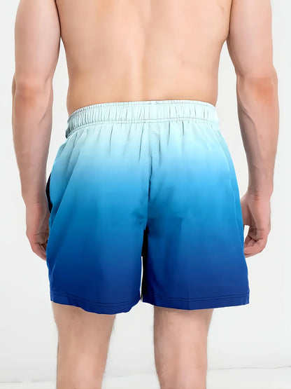 Blue gradient swim shorts worn by a person on a white background