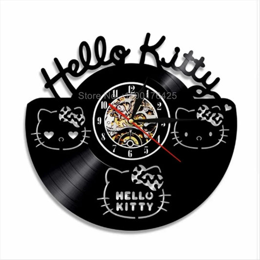 Hello Kitty-themed wall clock made from a vinyl record on a white background