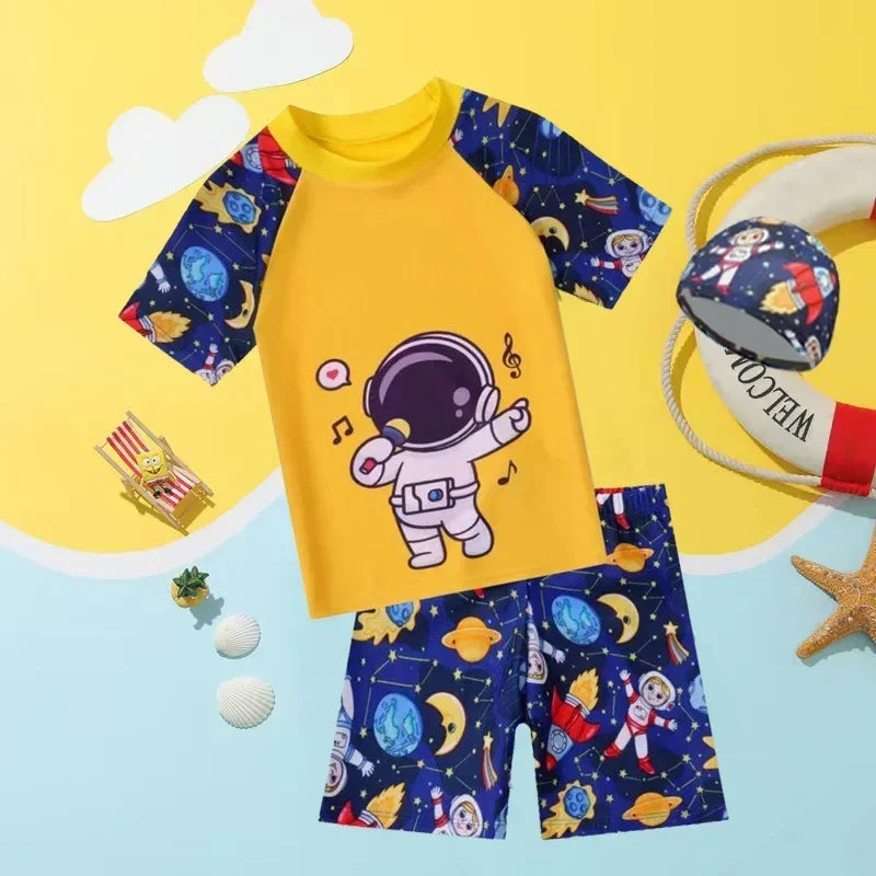 Children's swimsuit set with astronaut design on a yellow and blue background