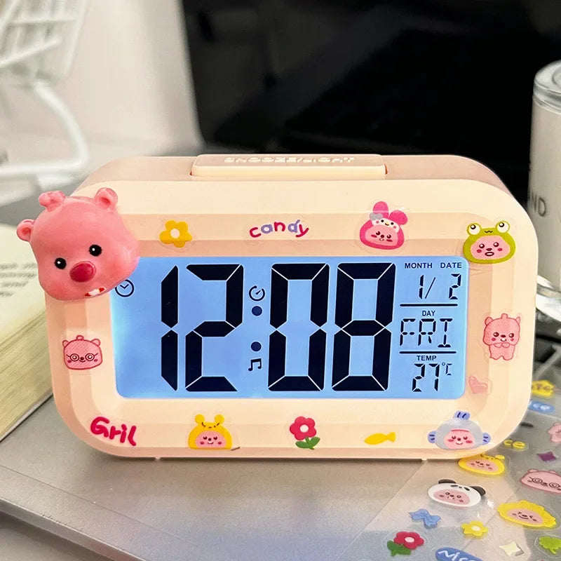 Children's digital clock with cartoon design on a desk