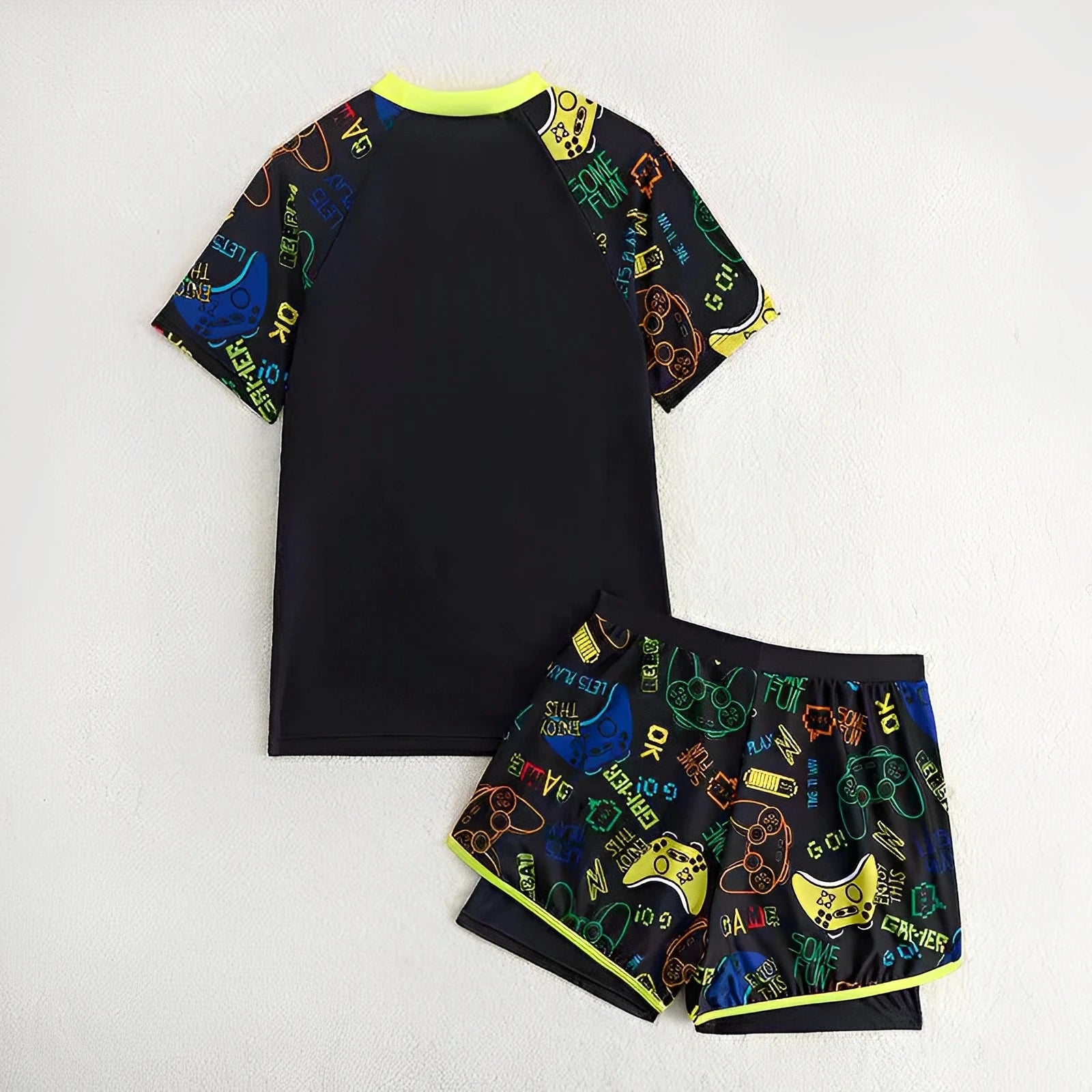 Black children's t-shirt and shorts set with colorful graphics on a white background