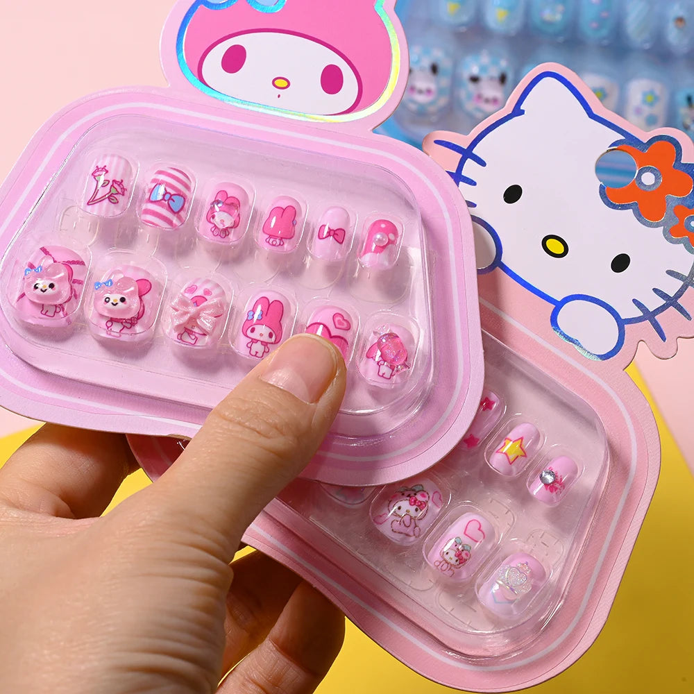 Children's false nail set with cartoon character design in a pink case.