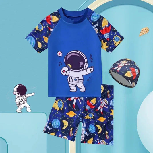 Children's swimsuit set with astronaut design on a blue background