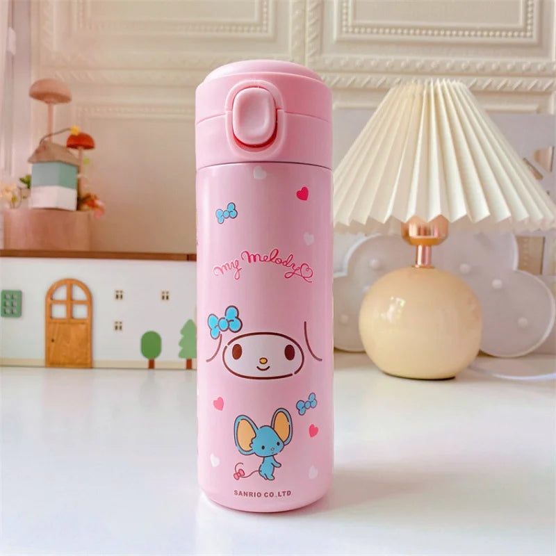 Pink thermos bottle with cartoon character design on a white surface