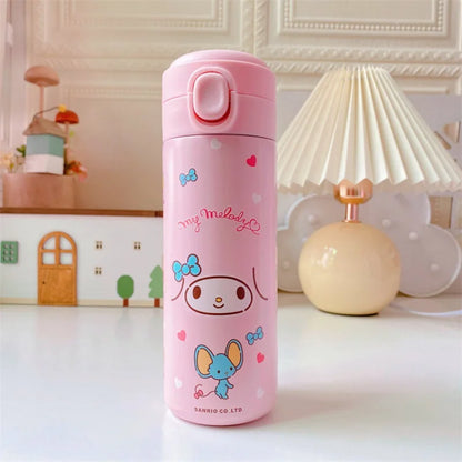 Pink thermos bottle with cartoon character design on a white surface