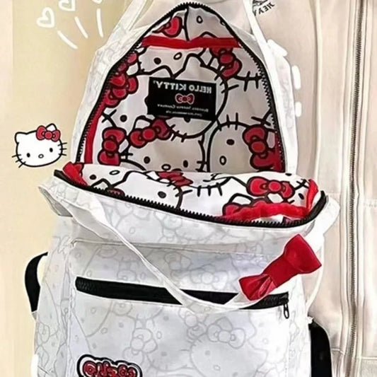 Hello Kitty shark-themed backpack with red bows on a beige background