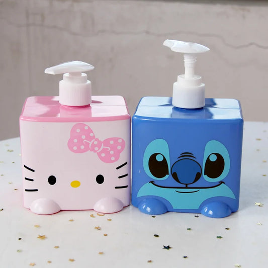 Two cartoon-themed soap dispensers, one pink with a bow and one blue with a character face, on a neutral background.