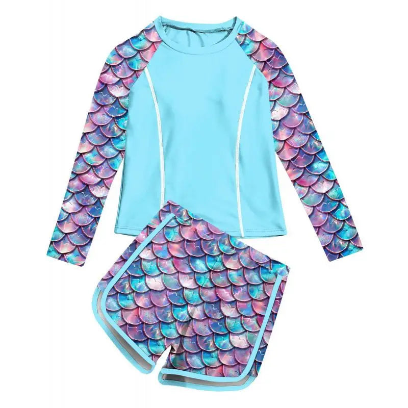 Two-piece swimsuit with mermaid scale design on a white background