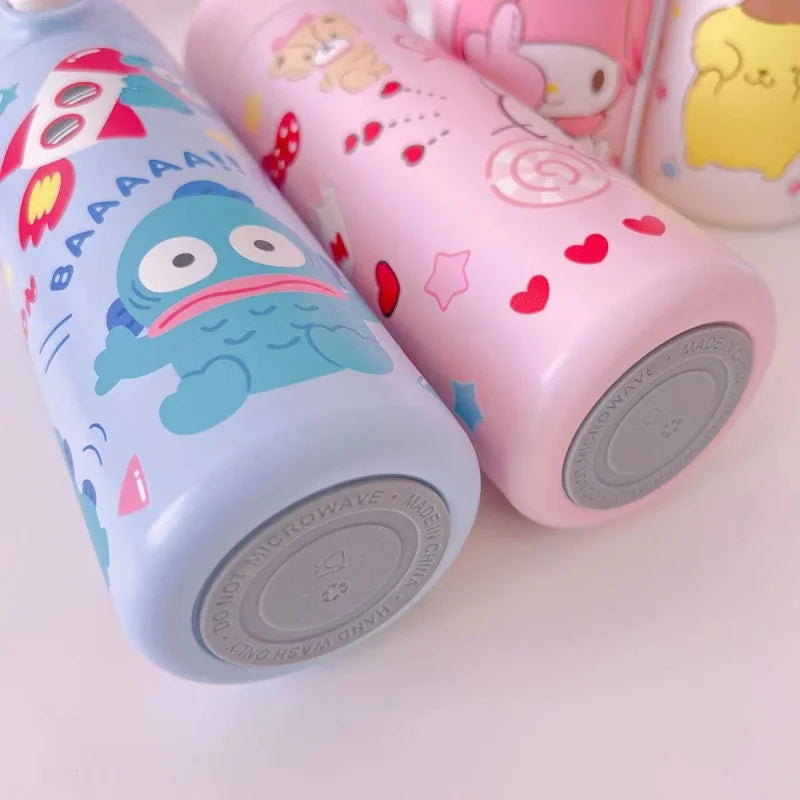 Two colorful water bottles with cartoon designs on a light background