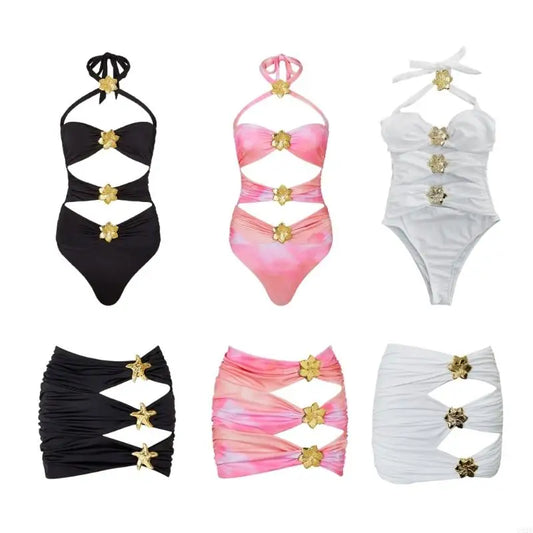Set of black, pink, and white swimsuits with gold accents on a white background