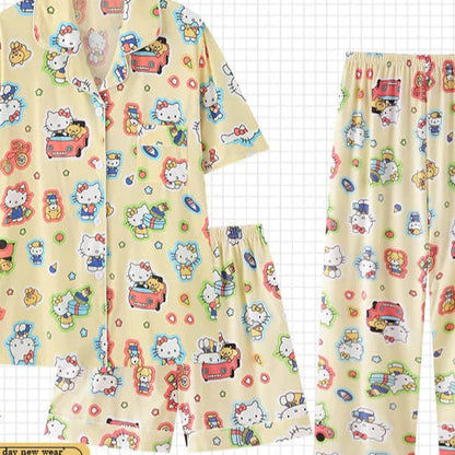 Hello Kitty pajama set with matching robe on a colorful grid background, featuring the PAJAMSO brand.