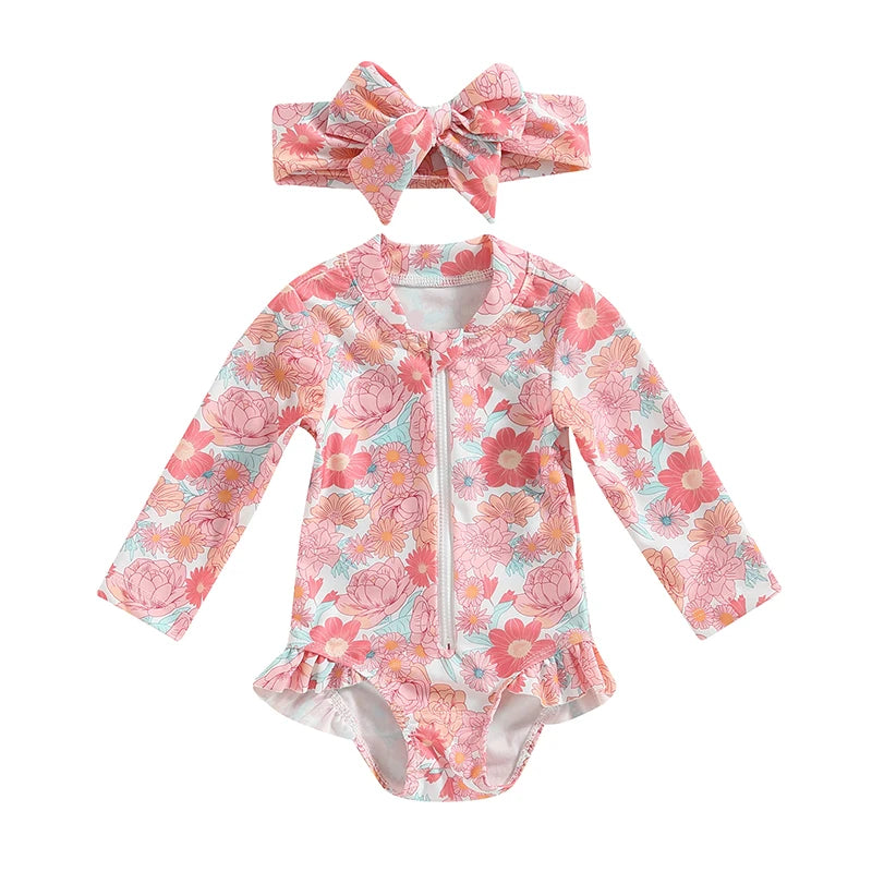 Floral swimsuit with matching headband on a white background