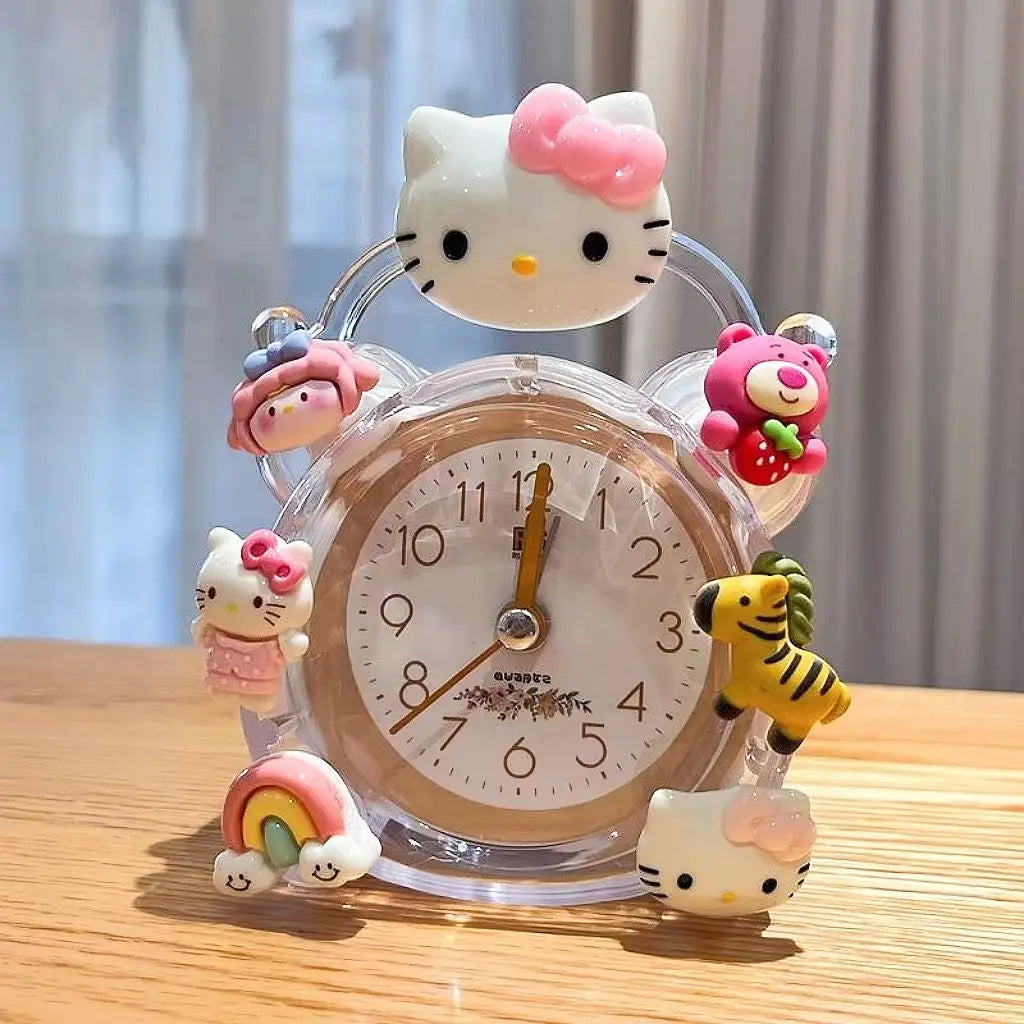 Hello Kitty-themed alarm clock with decorative characters on a wooden surface