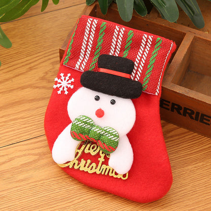 Sac de Noël avec chaussettes dorées