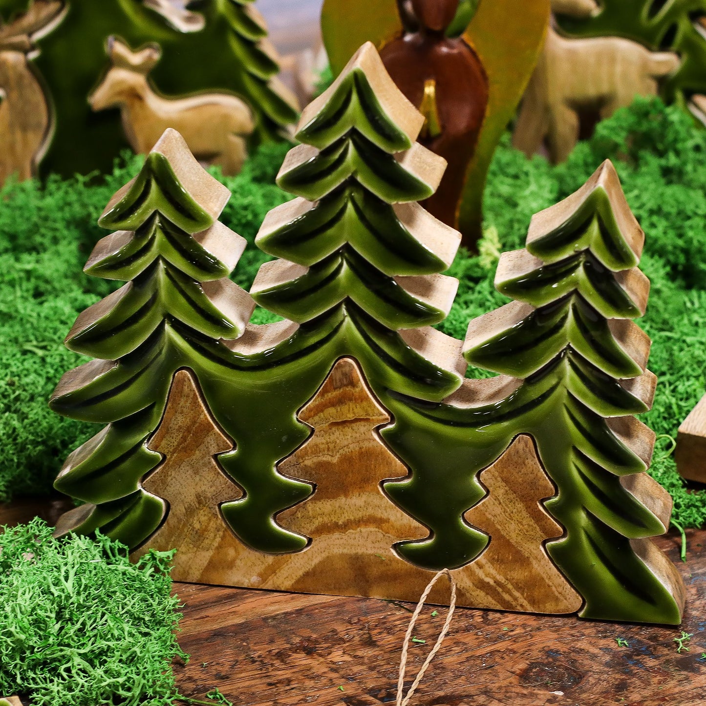 Lost In The Forest - Three Trees 3D Wooden Decoration surrounded by moss, featuring vivid green enamel trees, perfect for bringing nature indoors as a {{scent}} {{product_type}} – Christmas Gift Home Fragrance.