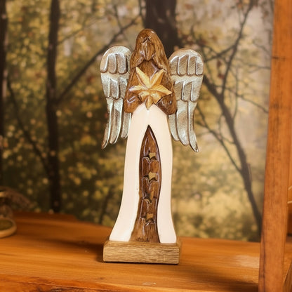 Elegant 30cm Mango Wood Angel with Metal Wings & Enamel Detail placed on a wooden shelf, adding warmth to the decor, making it a delightful Christmas gift for any home.