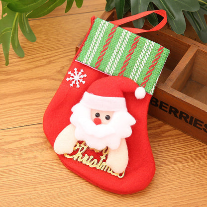 Sac de Noël avec chaussettes dorées