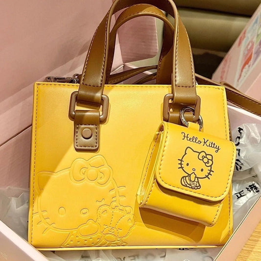 Hello Kitty Shoulder Bag | Crossbody Handbag with Headphone Pouch - Cake Pops Parties