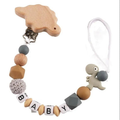 Personalized Baby Pacifier Clip Dinosaur Teether - Cake Pops Parties