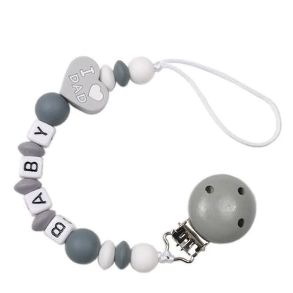 Personalized Baby Pacifier Clip Dinosaur Teether - Cake Pops Parties